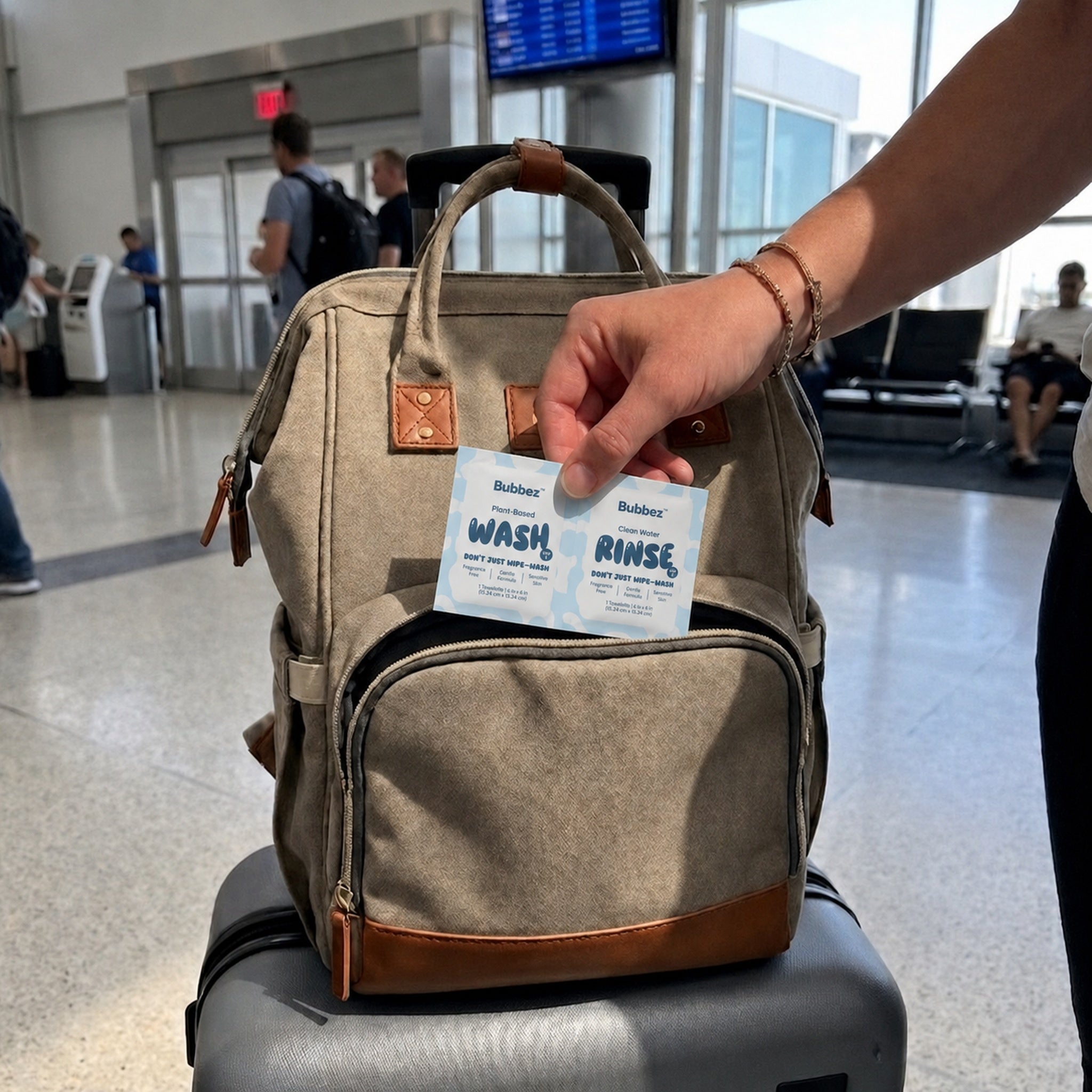 Bubbez twin sachet being pulled from a backpack at an airport