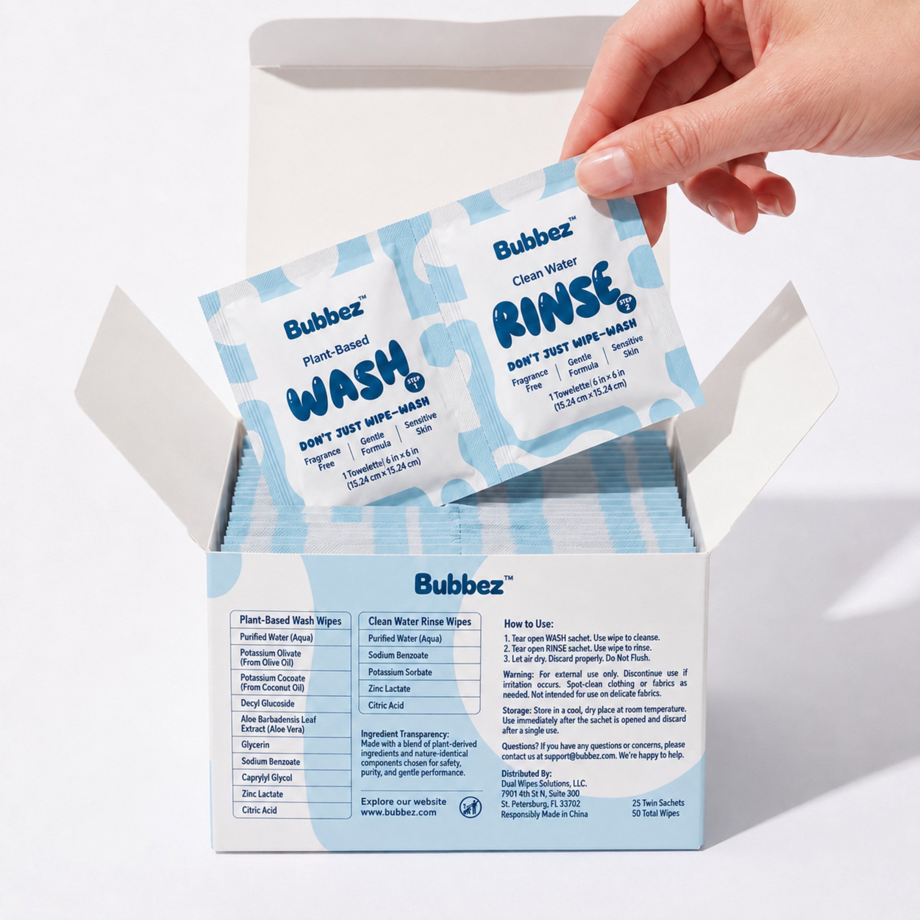 Bubbez twin WASH+RINSE sachet being pulled from the 25-count retail box