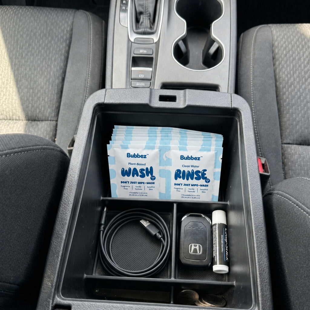 Bubbez twin sachet sitting in a vehicle center console
