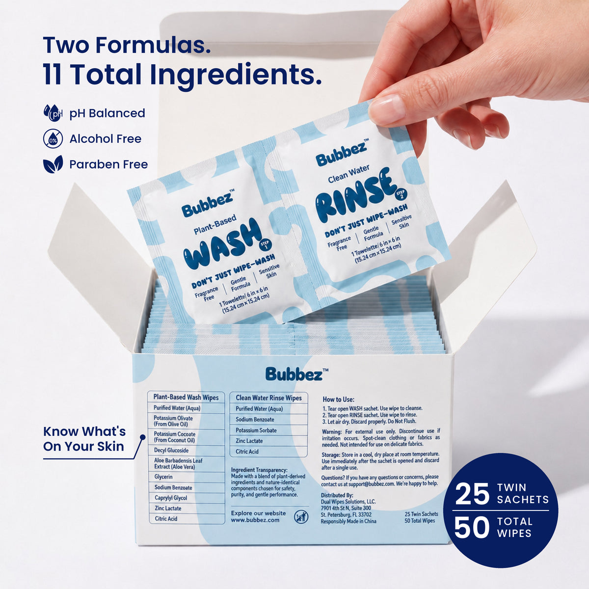 A hand lifts a Bubbez WASH and RINSE twin sachet from an open 25 count box. The box panel lists the full ingredients for both formulas alongside the how to use steps. Headline reads Two Formulas. 11 Total Ingredients, with pH Balanced, Alcohol Free and Paraben Free icons and a 25 twin sachets, 50 total wipes badge.