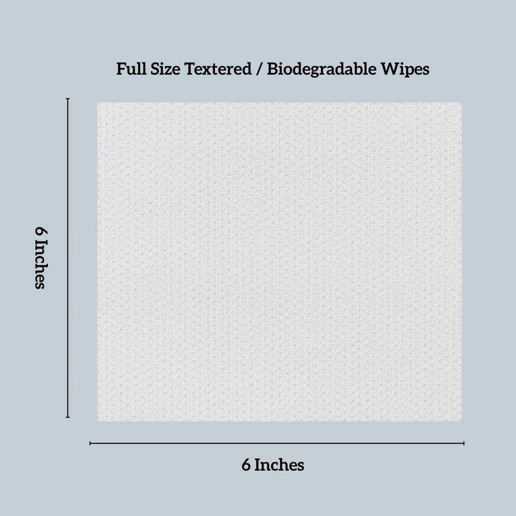Textured biodegradable wipe with dimensions on a light blue background