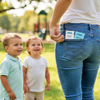 Person wearing blue jeans with Bubbez Soap + Rinse Wipes, standing in a park with two children.