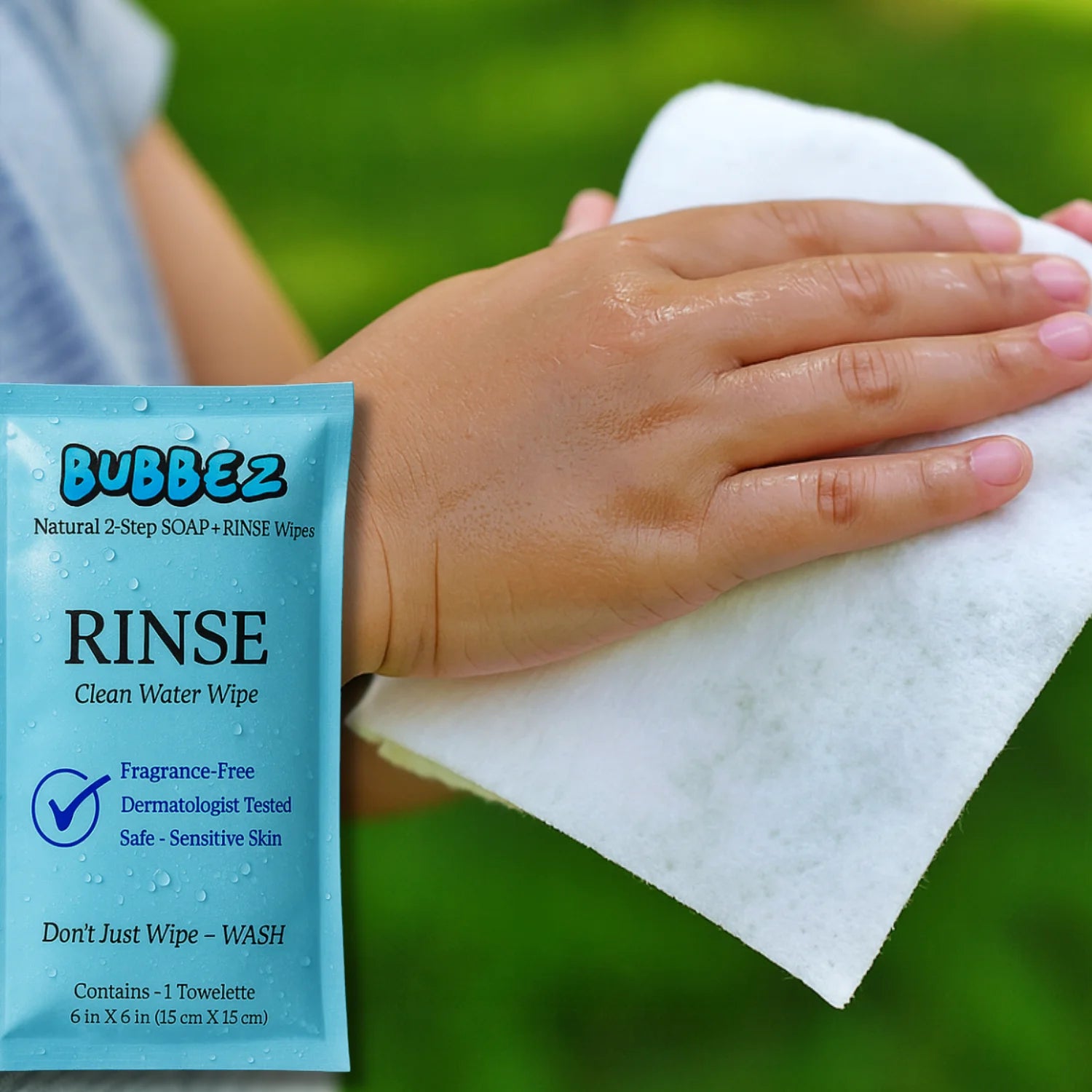 Child using Bubbez Rinse Wipe on hands