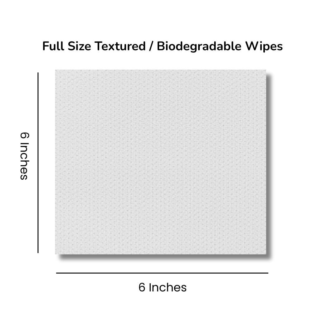 Full size textured biodegradable wipe with dimensions labeled on a white background