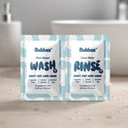 Two packages of Bubbez wipes labeled 'Wash' and 'Rinse' on a wooden surface.